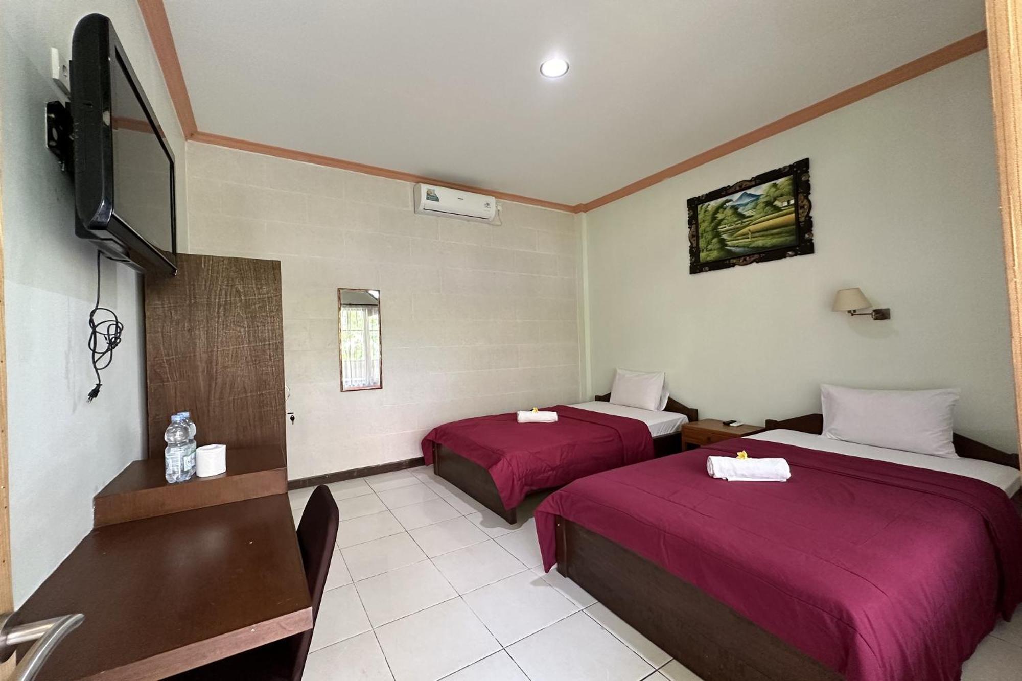 Taxa Raya Guest House Легиан Экстерьер фото