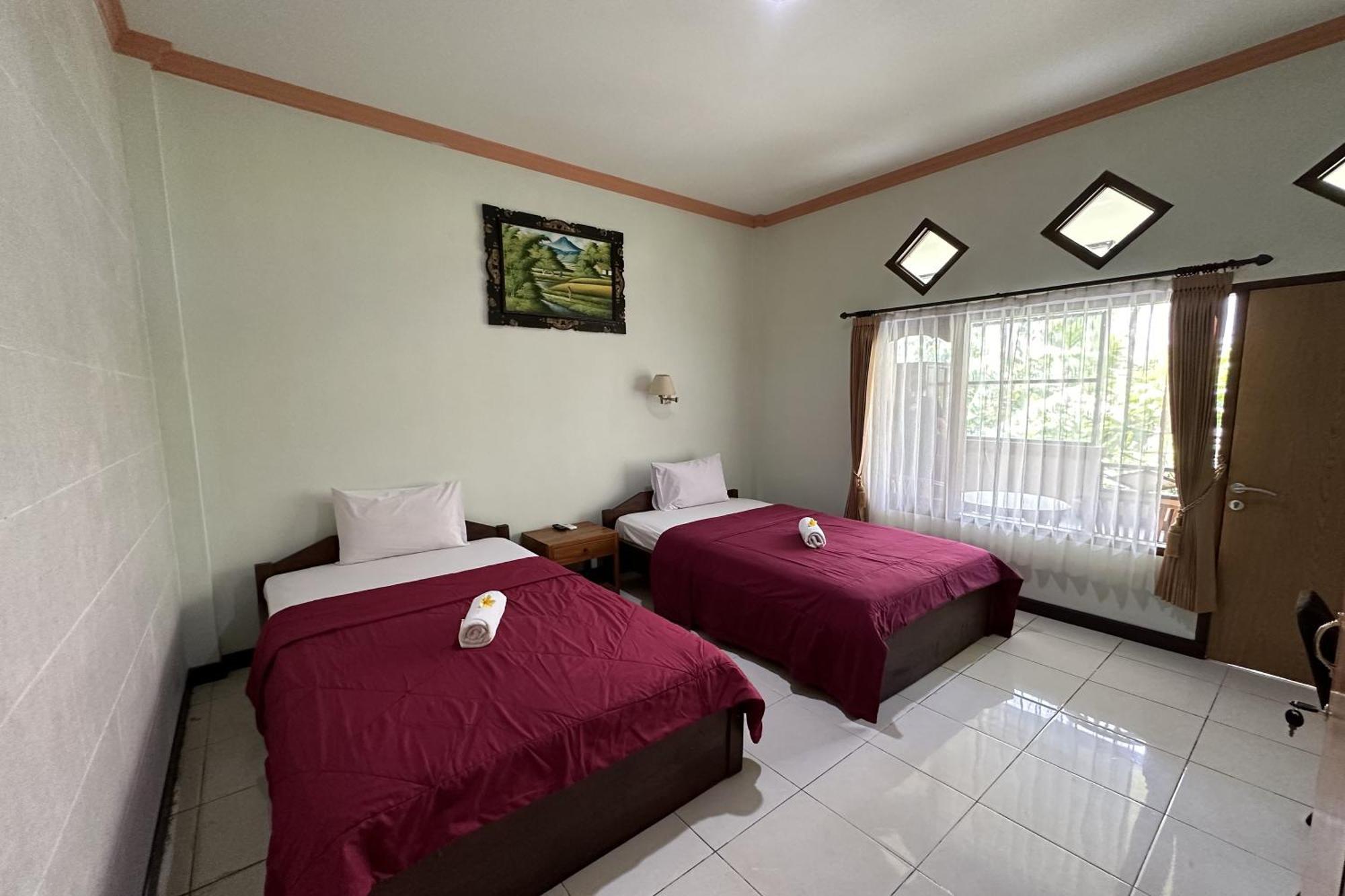Taxa Raya Guest House Легиан Экстерьер фото